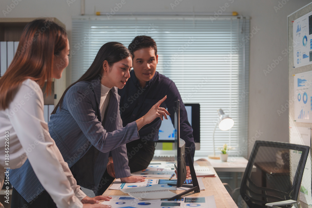 Poster asian businesspeople collaborating in a modern office, analyzing financial data displayed on a compu