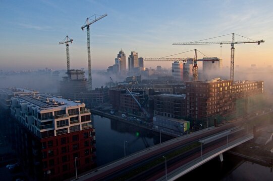 Amsterdam Netherlands - 27 March 2025 - Birds eye view of building site in Amsterdam Overamstel in the early morning - redevelopment of an industrial area into a residential area - Powered by Adobe