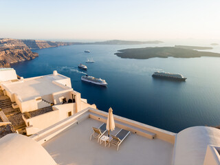 White architecture in Santorini island, Greece. Beautiful seascape at sunset.