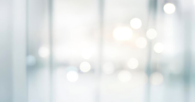 Subtle blur highlights a clean, modern office atmosphere. Modern blurred background photo for banner, poster or magazine and website background.