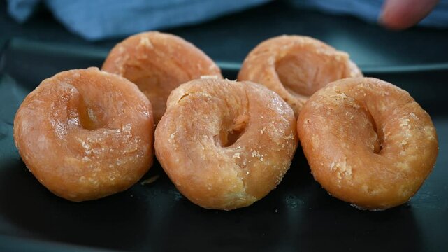 Serving badusha Indian sweet dish in a plate.