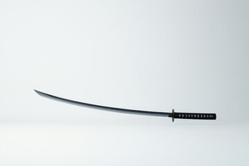 single saber or cutlass positioned against seamless white backdrop