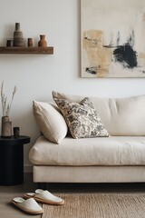 Beige Sofa with Patterned Cushion, Modern Artwork, Shelf with Vases, Home Interior