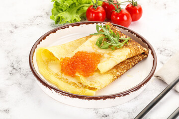 Russian pancake with red caviar