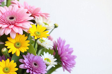 vase filled with lots of flowers on top of a table