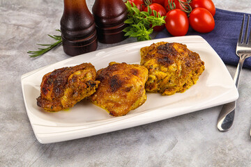 Roasted chicken thighs  with spices