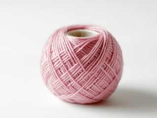 A Close-up of a Soft Pink Ball of Yarn.