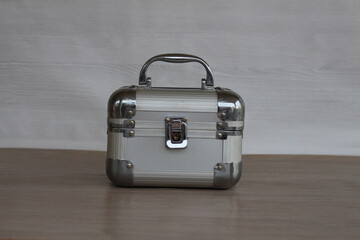 vintage suitcase on a wooden background