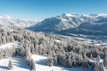 Aerial view of the Upper Valais from Crans Montana in winter with the Rhone Valley covered in snow
