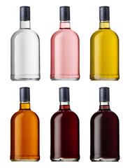 Set of a glass bottle with different color liquids. Isolated on a white background. Alcohol drinks: gin, vodka, brandy, rum, liqueur, whisky.