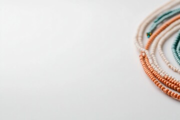 minimalistic close-up of eid al-adha decorations arranged elegantly with prayer beads and traditional embellishments