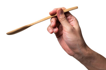 Male hand holding a wooden spoon isolated on white background.