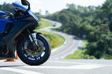 motorcycle in a sunny motorbike on the road riding.with sunset light. copyspace for your individual...