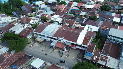 Aerial view of the city with many buildings and housing