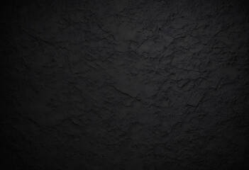 photo The background of a rough, dark textured surface fills the frame. The texture is black, with subtle variations in color that suggest a rough, cracked surface. Black day