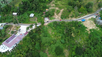 Aerial view of the mountain atmosphere and green trees in the countryside