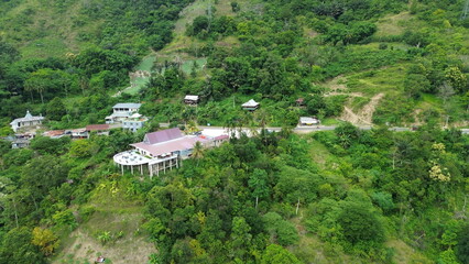 Aerial view of the mountain atmosphere and green trees in the countryside