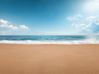 Fototapeta premium Calm beach at sunrise with gentle waves lapping on the shore and a clear blue sky