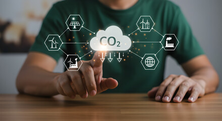 Man Touches Cloud Icon With CO2 Emission Reduction Symbols For Climate Change Mitigation