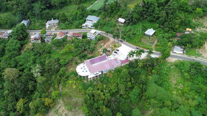 Aerial view of the mountain atmosphere and green trees in the countryside