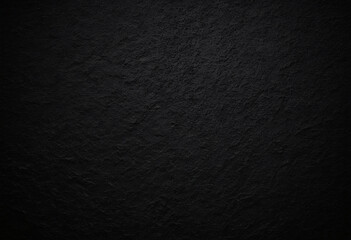 Photo of a rough wall with a thick, dark texture filling the frame. Black day, the texture is black, with subtle color variations that indicate a rough, cracked surface.