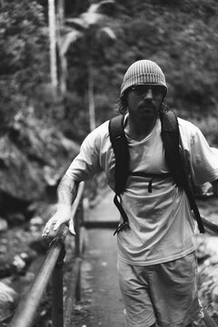 Man on a waterfall trail in Australia