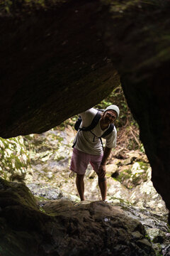 Man on a waterfall trail in Australia