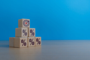 Interest rate hike target on wooden blocks