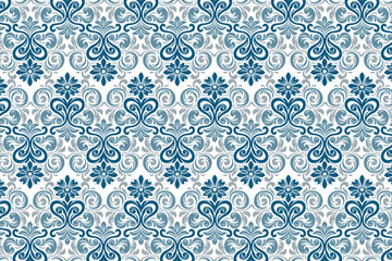 seamless bohemian blue flower pattern with ikat damask texture for wrapping, textile backgrounds, and fabric design

