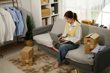 Young Woman Running Online Business from Home Office, Entrepreneur Managing E-commerce Sales
