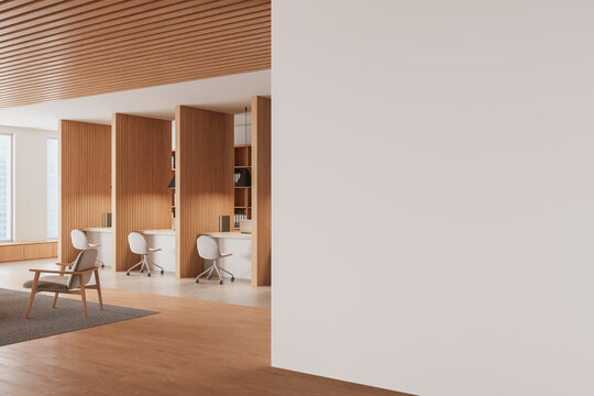 Modern coworking office interior with wooden partitions, white chairs, and minimalist furniture in warm tones and natural lighting. 3D Rendering. 3D Rendering