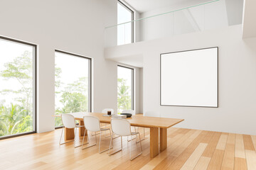 Blank poster mockup on bright wall in modern office with wooden floor, large windows, and minimal furniture layout for clean design presentation. 3D Rendering