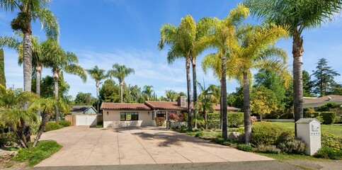 Fototapeta premium Spacious modern home with open layout, upgraded kitchen, light-filled bedrooms, scenic aerial views,