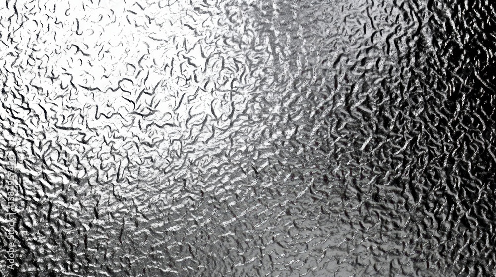 Poster metallic surface displaying intricate textured pattern, generating geometric abstract visual effect 
