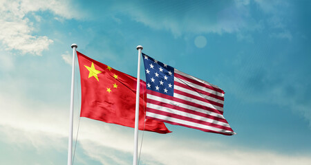 China and America friendship flags are waving in the sky.Two country flag for agreement or deal. China USA national flag for comittment.