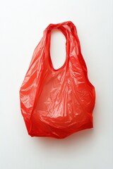 Red Plastic Bag: A vibrant, translucent red plastic bag, its form softly illuminated, hinting at the shape of something carried within. This common, everyday item.