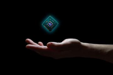 A computer chip hovers above a hand on a black background. The processor has an AI symbol on it.