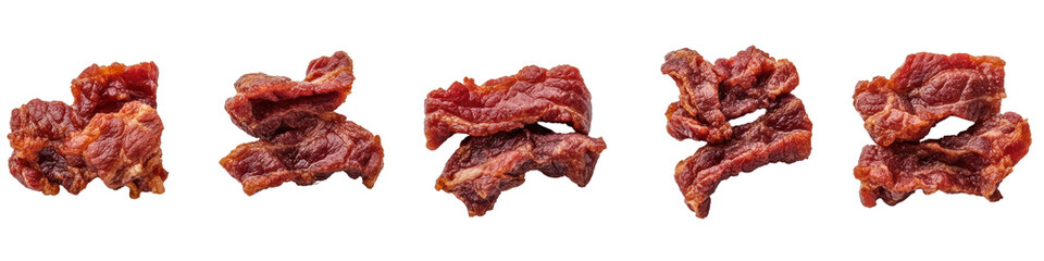 Dried beef jerky pieces in various shapes and textures, showcasing their rich color and rugged surface.