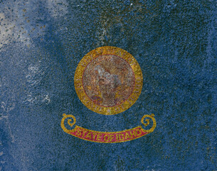 Idaho State Flag. Dirty Idaho state flag on rusty metal surface.