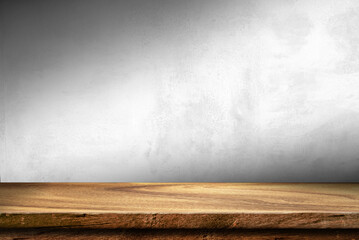 Wooden table in white cement room background concept for advertising