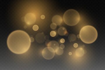 Gold bokeh on a transparent background. Abstract shiny sparkling effect.