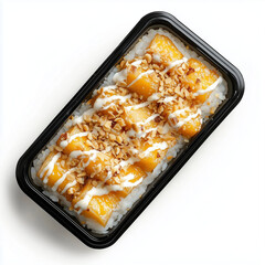 Mango sticky rice in a black plastic box on white background