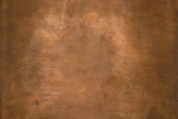 Brass or copper background, texture of a vintage red metal plate. Copy space. 