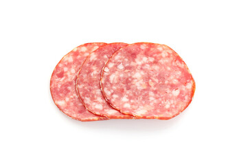 Slices of tasty smoked sausage on white background, above view