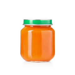 Baby food. Tasty puree in glass jar isolated on white