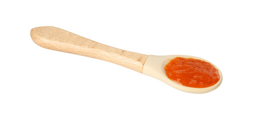 Baby food. Spoon with tasty puree in air on white background