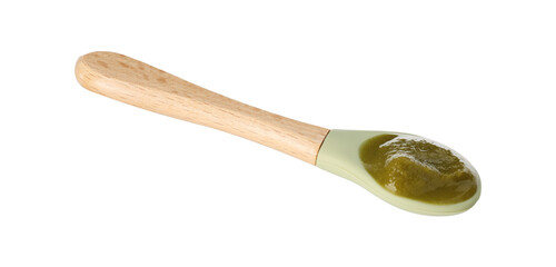 Baby food. Spoon with tasty puree in air on white background