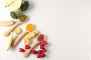 Baby food. Tasty puree in spoons and different ingredients on white background, flat lay. Space for text