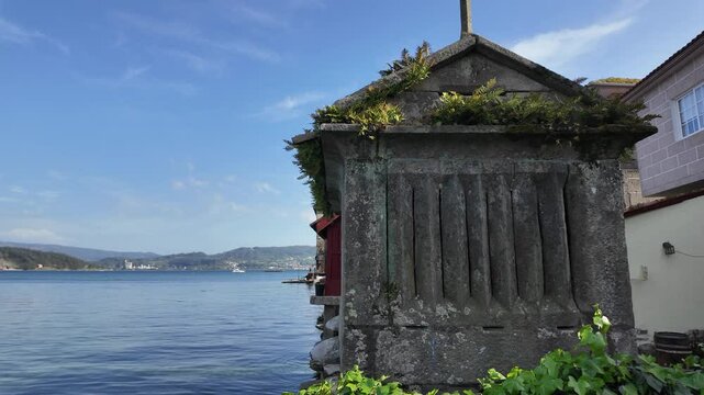 Combarro, horreos and stone crosses overlooking peaceful water in galicia, spain