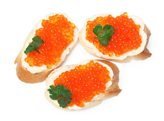 Tasty sandwiches with red caviar isolated on white, top view